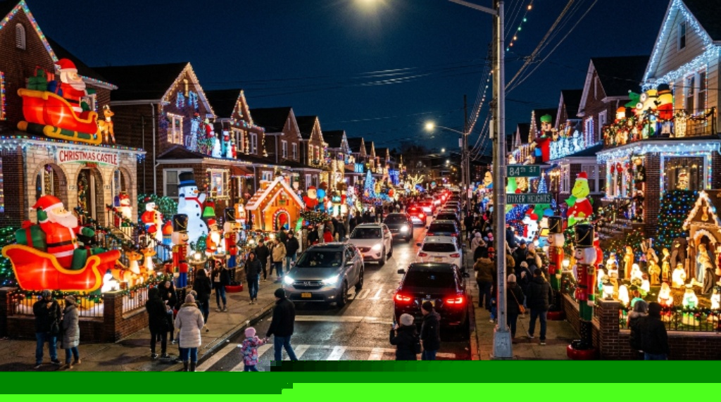 Rows of elaborately decorated homes on 84th Street in Dyker Heights, Brooklyn, glowing with Christmas lights, giant nutcrackers, and inflatable displays on a December evening in 2026