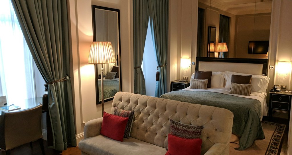 Modern mid-range hotel room near Rockefeller Center with comfortable amenities and city view